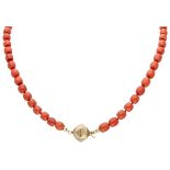 Vintage single strand red coral necklace with a 14K. yellow gold closure.