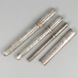 4-piece lot needle cases silver.