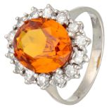 Vintage 18K. white gold entourage ring set with approx. 5.15 ct. synthetic orange sapphire and appro
