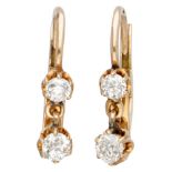 Antique 14K. yellow gold earrings set with approx. 0.52 ct. diamond.