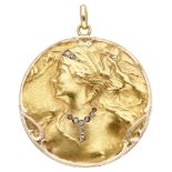 14K. Yellow gold Art Nouveau pendant with an elegant diamond lady in profile.