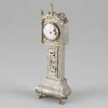 Miniature grandfather clock silver.