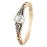 Vintage 14K. yellow gold solitaire ring set with diamond in silver.