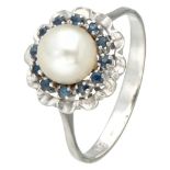 14K. White gold cluster ring set with sapphire and freshwater pearl.