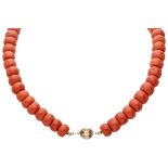 Vintage single strand large red coral necklace with a 14K. yellow gold closure.