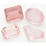 Lot of 4 faceted natural rose quartz.