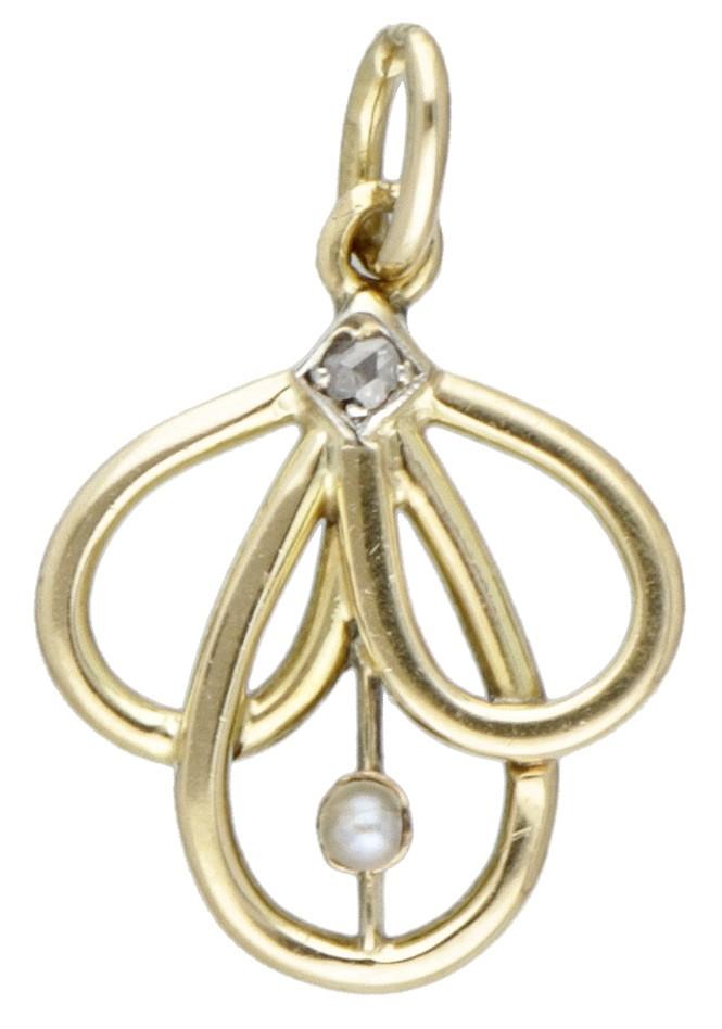 14K. Yellow gold vintage pendant set with a rose cut diamond and a seed pearl.