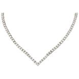 18K. White gold entourage necklace set with approx. 8.75 ct. diamond.