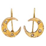 Antique 22K. yellow gold crescent earrings set with seed pearls.