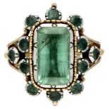 Antique 18K. yellow gold cocktail ring set with natural emerald in silver.