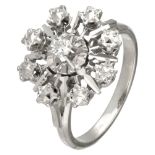 18K. White gold cluster ring set with approx. 0.09 ct. diamond in a flower-shaped centerpiece.