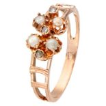 Antique 14K. rose gold ring set with rose cut diamonds and seed pearls.