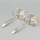 2-piece set of silver sifter spoons.