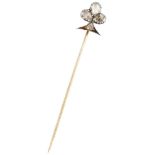 Antique 18K. yellow gold three leaf clover lapel pin set with diamond.