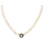 Vintage single strand pearl necklace with a 14K. yellow gold closure set with rose cut diamond.