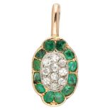 14K. Yellow gold pendant set with approx. 0.20 ct diamond and green gemstones.