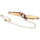 Antique 14K. rose gold brooch set with a rose cut diamond.