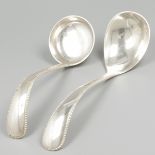 Compote & sauce spoon silver.
