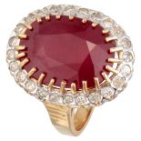 Vintage 10K. yellow gold entourage ring set with approx. 0.24 ct. diamond and ruby.