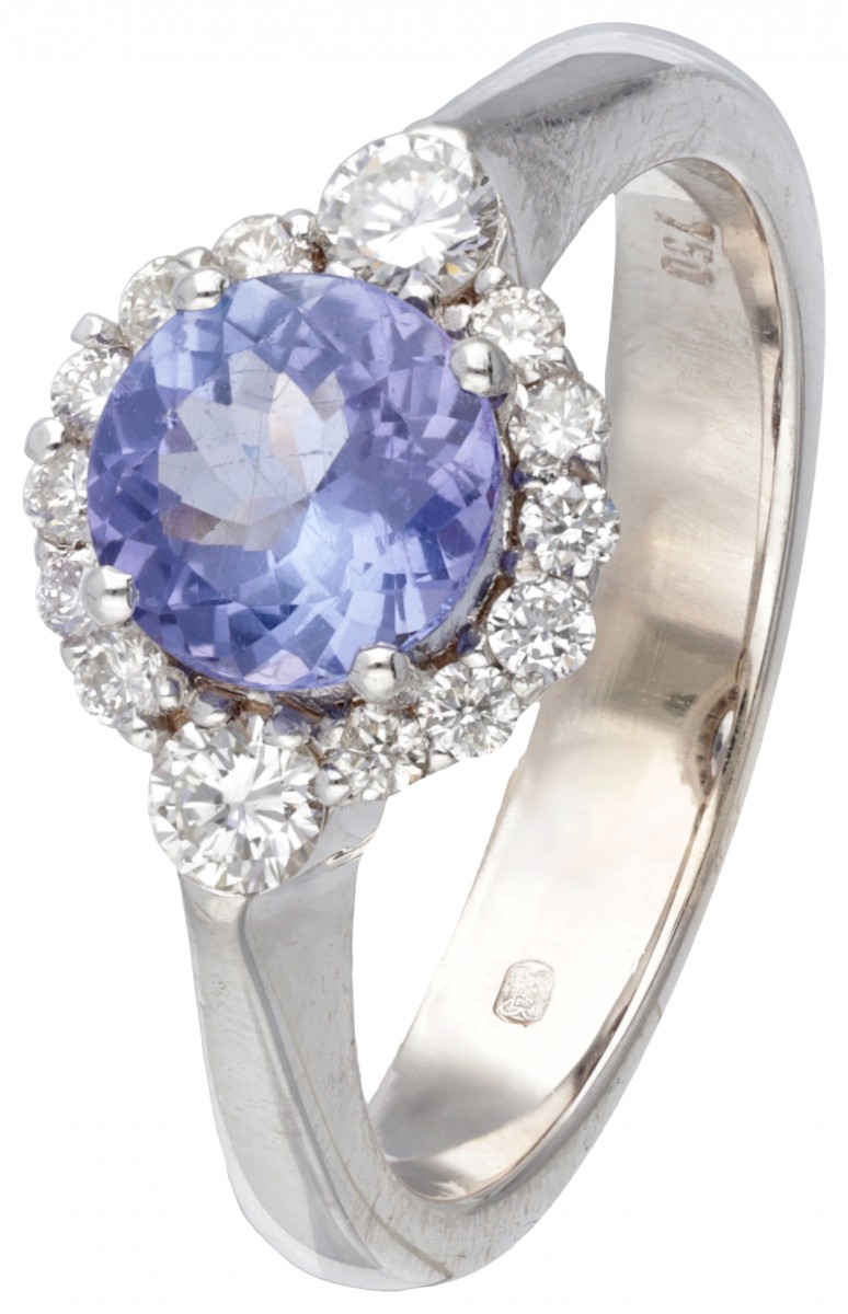 18K. White gold cluster ring set with approx. 0.32 ct. diamond and approx. 0.96 ct. tanzanite.