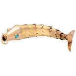 Vintage 10K. bicolor gold flexible fish pendant with set with blue colored stones in the eyes.