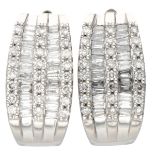 14K. White gold earrings set with approx. 0.96 ct. diamond.