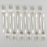 12-piece set of silver pastry forks.