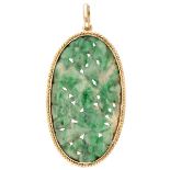 Vintage 14K. yellow gold pendant set with cut green stone.