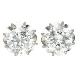 Vintage 14K. white gold solitaire ear studs set with approx. 1.18 ct. diamond.