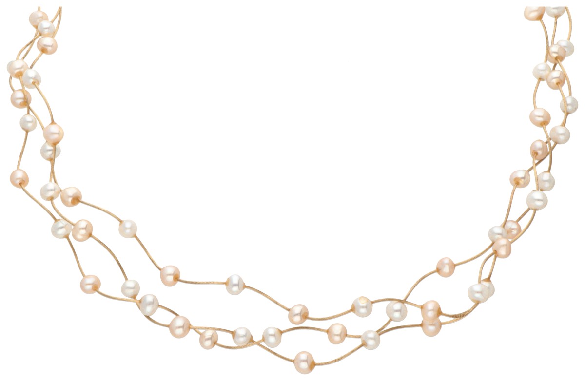 Three-row 18K. yellow gold necklace set with freshwater pearls.