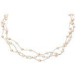 Three-row 18K. yellow gold necklace set with freshwater pearls.