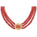 Three-row vintage red coral necklace with a 14K. yellow gold closure.