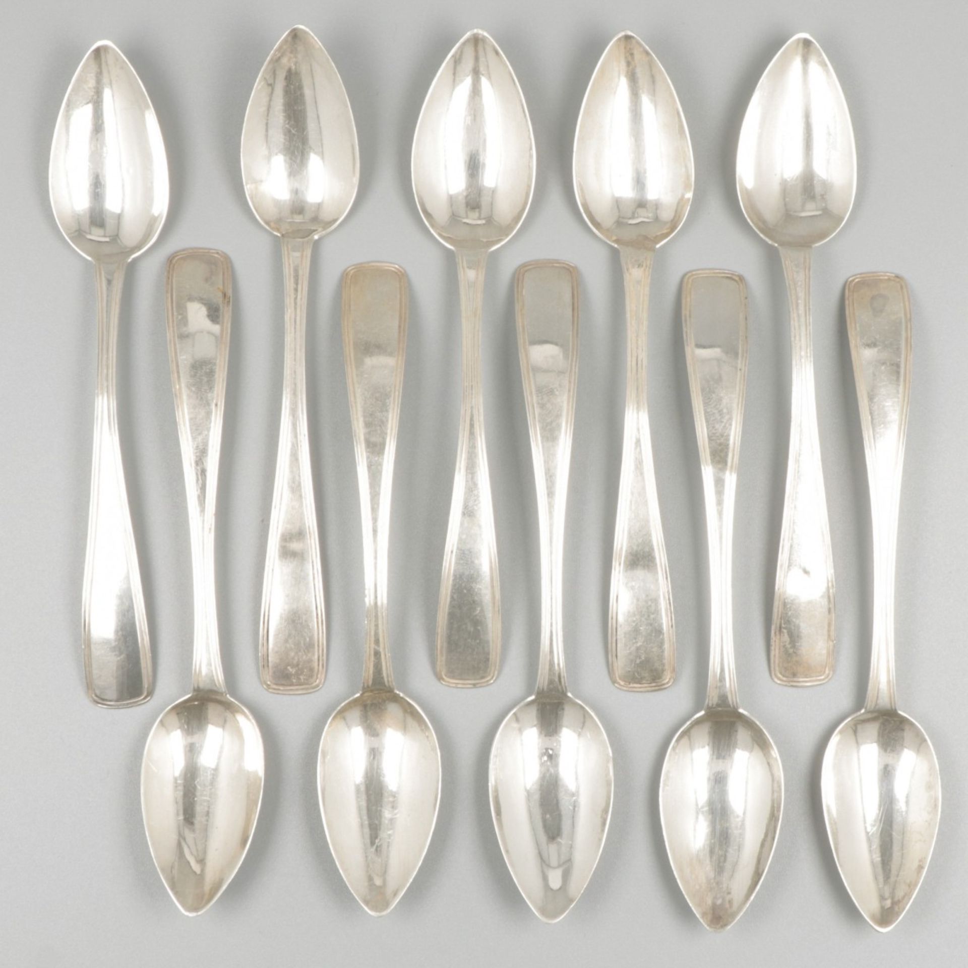 10-piece set of silver coffee spoons.