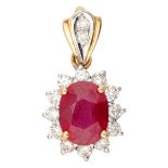 14K. Bicolor gold pendant set with approx. 0.25 ct. diamond and ruby.