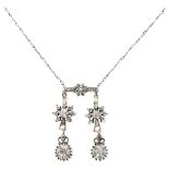 Antique silver necklace set with rose cut diamonds.