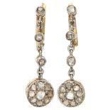 Antique 14K. bicolor gold earrings set with rose cut diamonds.