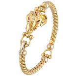 Vintage 18K. yellow gold bangle bracelet depicting an elephant head set with rubies.