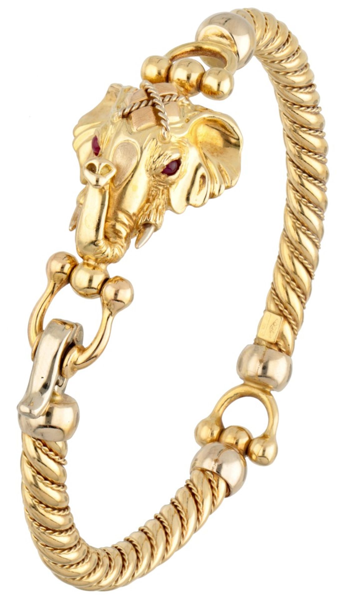 Vintage 18K. yellow gold bangle bracelet depicting an elephant head set with rubies.