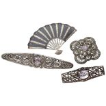 Lot of four silver vintage brooches, set with purple stone.