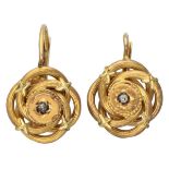 Antique 14K. yellow gold earrings with ornate details.