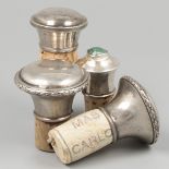 4-piece lot bottle stoppers silver.