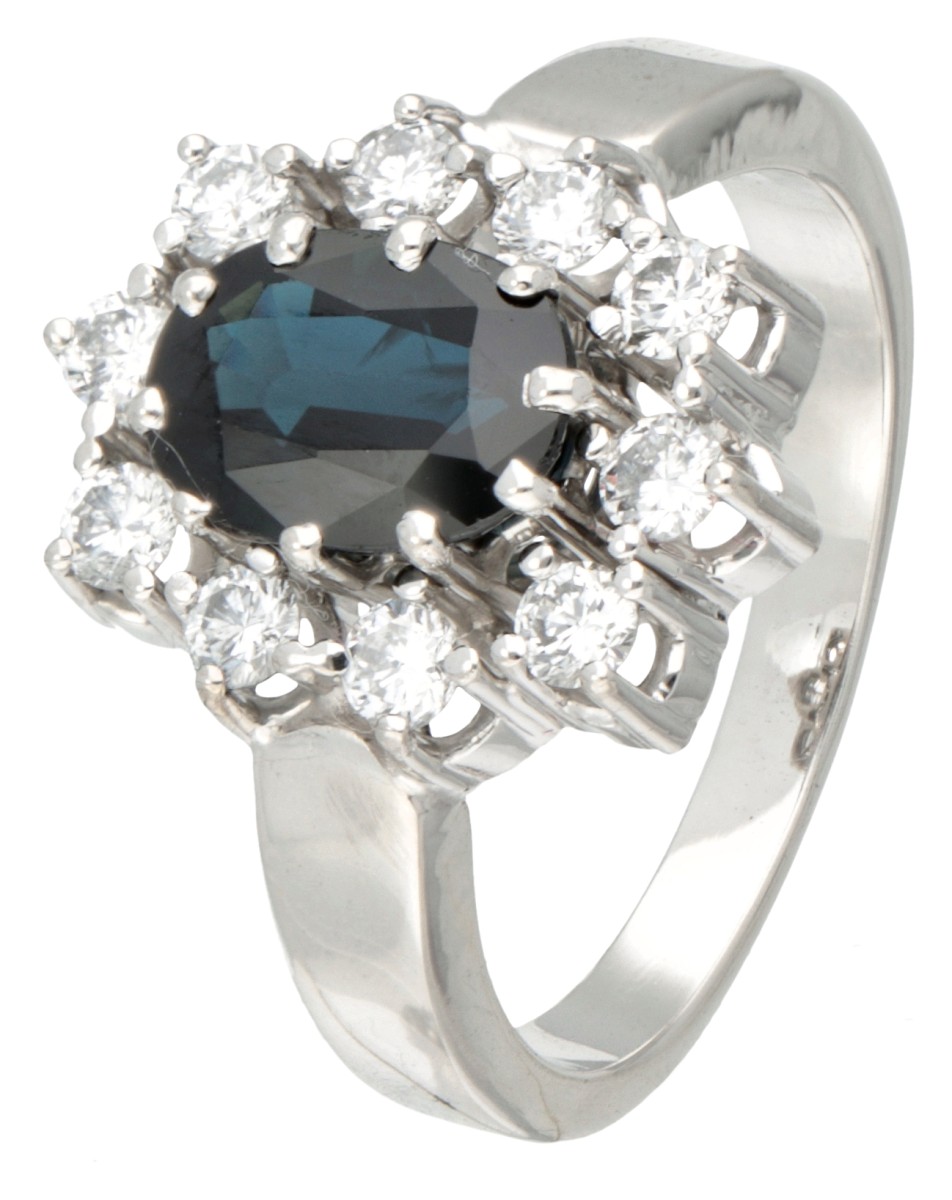 14K. White gold entourage ring set with approx. 1.48 ct. natural sapphire and approx. 0.50 ct. diamo