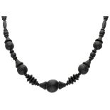 Vintage mourning necklace consisting of jet, with various beads strung on black thread.