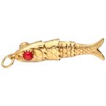 Vintage 18K. yellow gold flexible fish pendant set with red colored stones in the eyes.