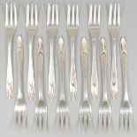 12-piece set of silver pastry forks.