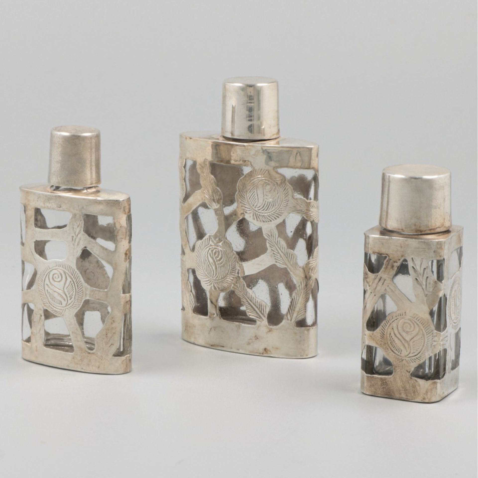 3-piece lot of perfume bottles silver.