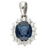 14K. White gold entourage pendant set with approx. 4.60 ct. natural sapphire and approx. 0.70 ct. di