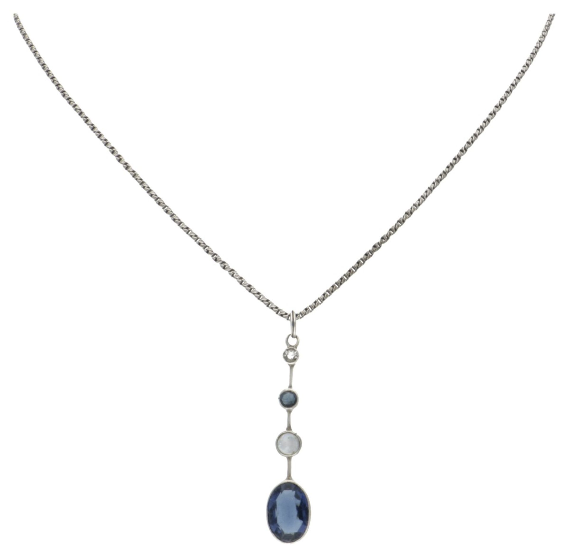 Sterling silver necklace with 835 silver pendant set with blue colored stones and mother-of-pearl.