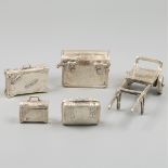 Miniature trolley with cases silver.