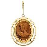 Vintage yellow gold plated sterling silver medallion pendant set with a cabochon cut tiger eye and a